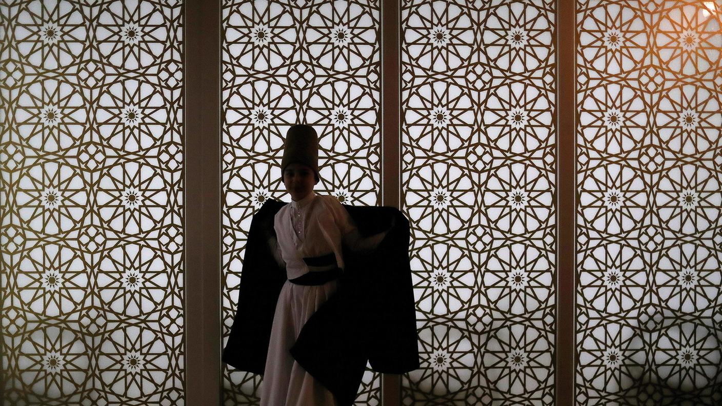 A dervishe prepares for a 'Seb-i Arus' ceremony at Bahariye theater in Istanbul, Turkey, 12 December 2018
