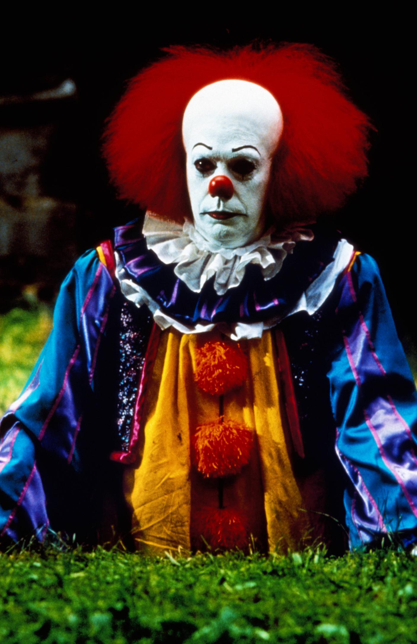 Tim Curry nei panni di Pennywise, 1990
