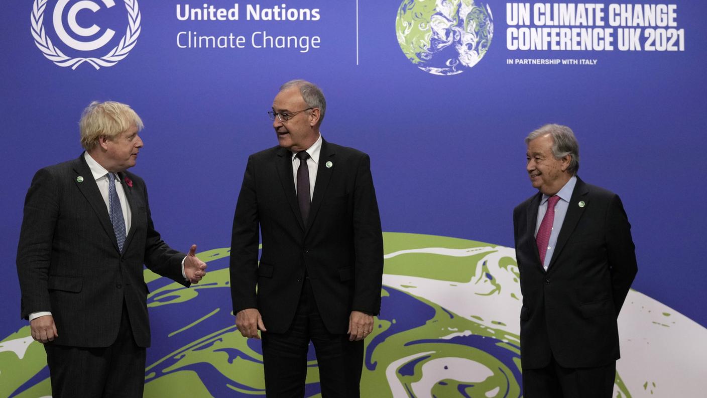 Il presidente della Confederazione Guy Parmelin con Boris Johnson e Antonio Guterres