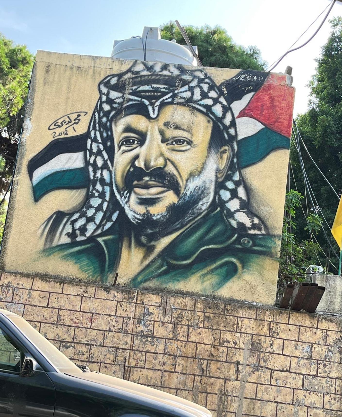 Un murales con il volto di Arafat