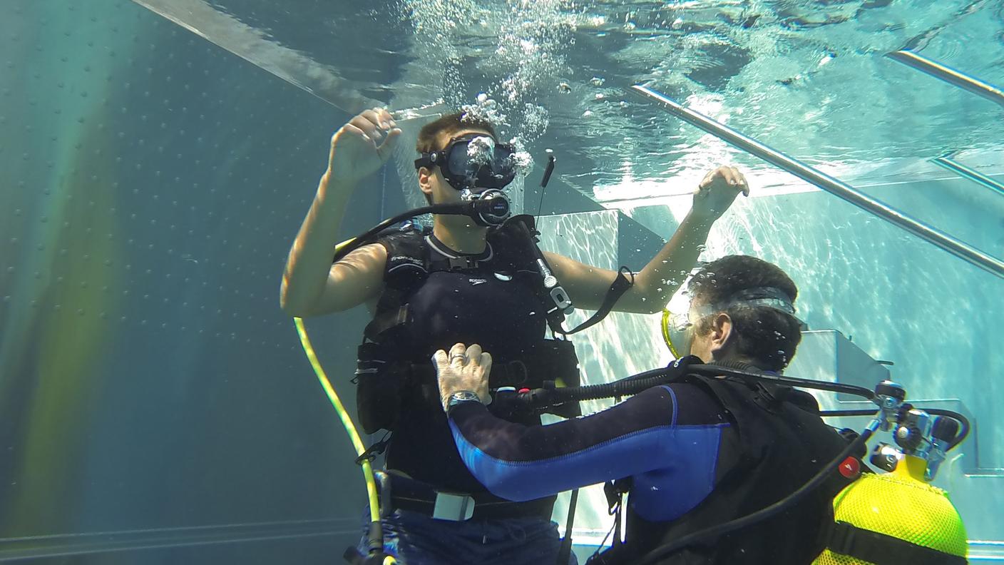 Battesimo in acqua contro la violenza delle donne