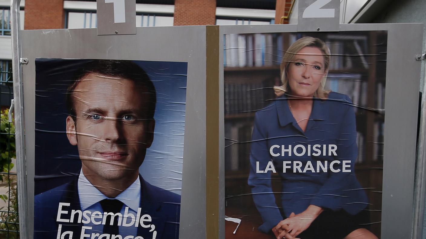 Macron (a sinistra) e Le Pen, giornata clou per i candidati all'Eliseo.