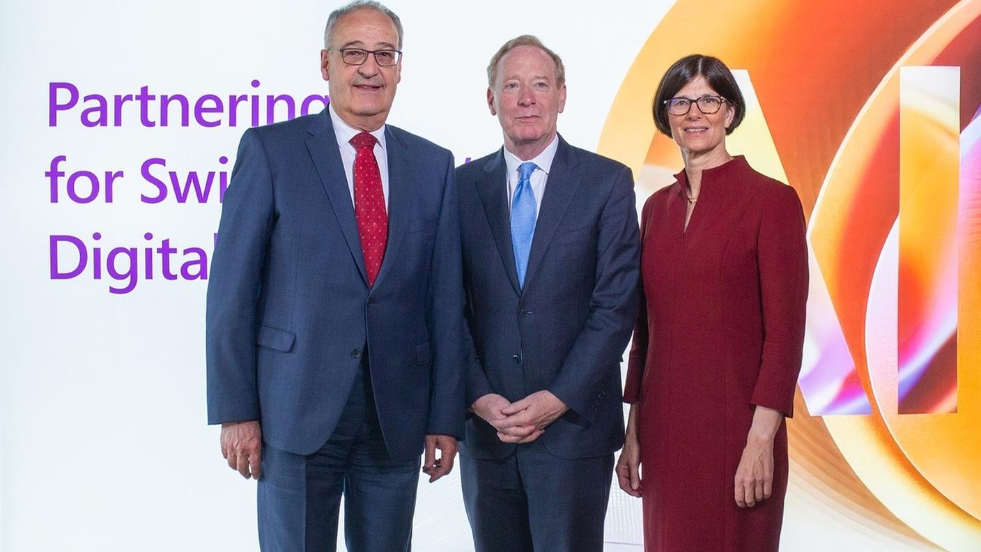 Guy Parmelin , Brad Smith e Catrin Hinkel