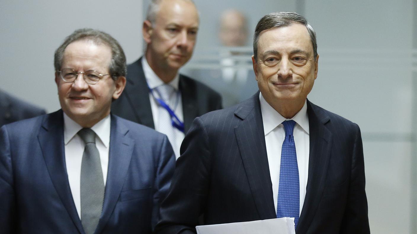 A destra, Mario Draghi