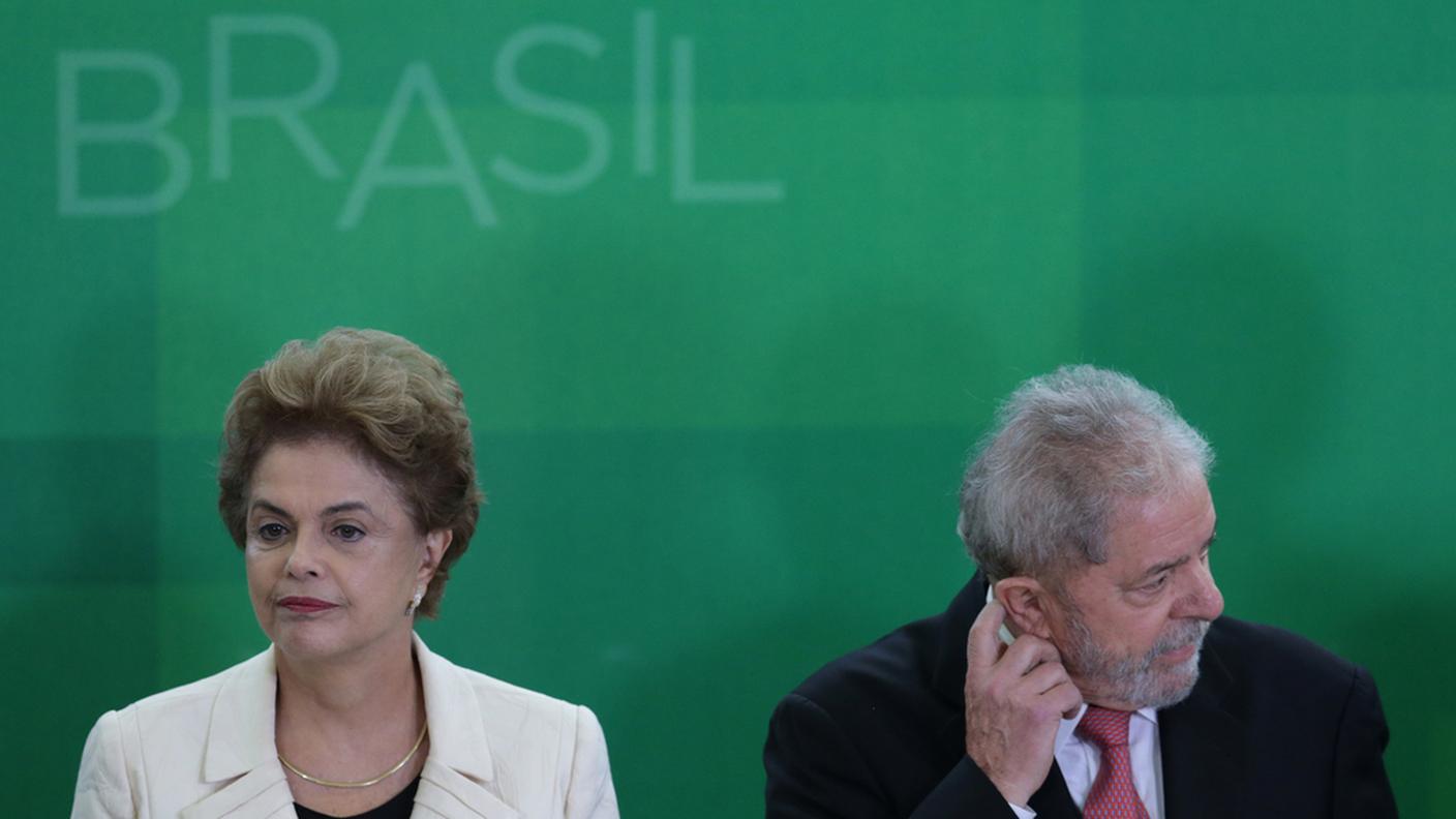 La "presidenta" e il suo predecessore