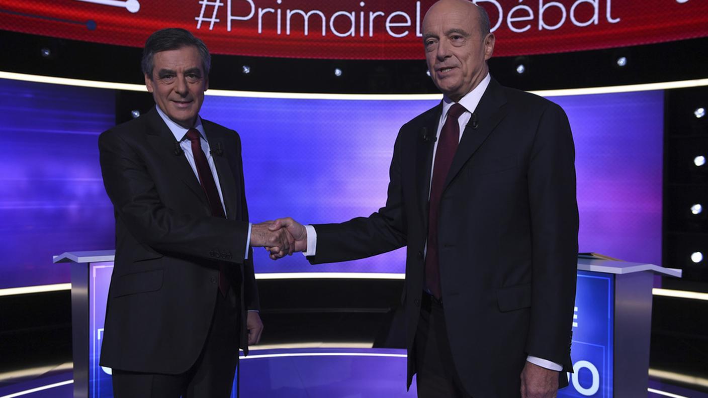 Il dibattito tra Alain Juppé e Francois Fillon
