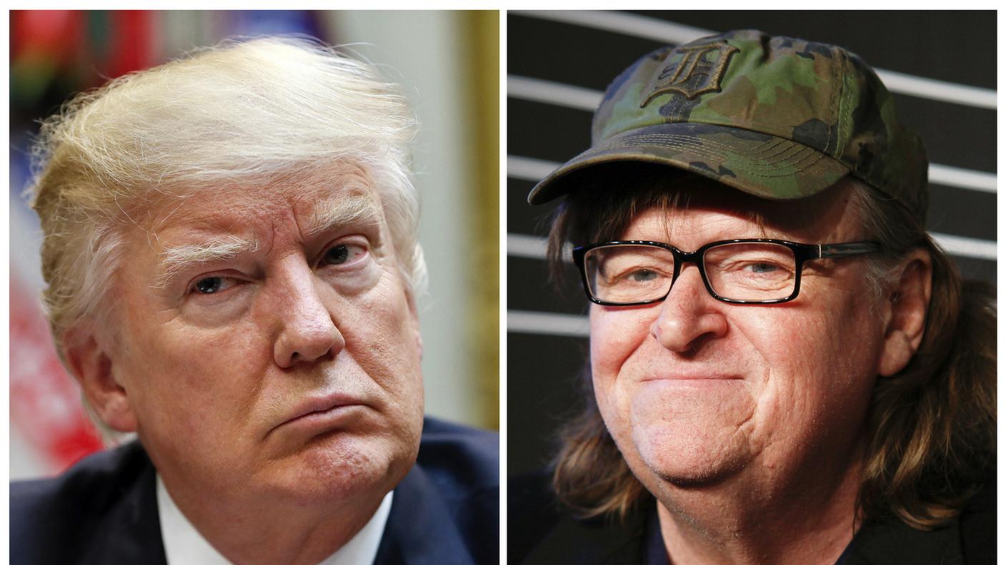 Il presidente Donald Trump e il regista Michael Moore