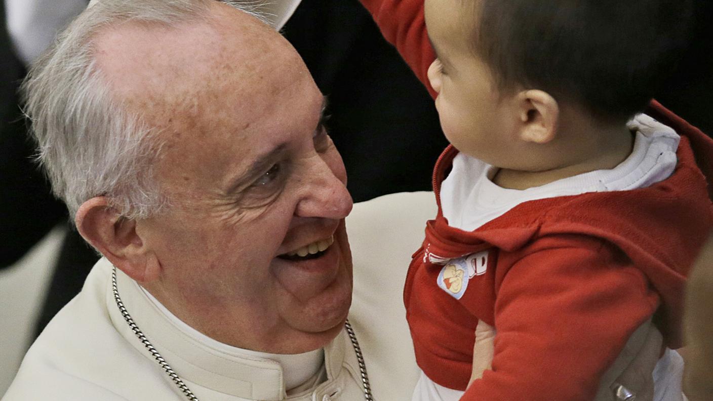 Con un bambino in Vaticano, dicembre 2013