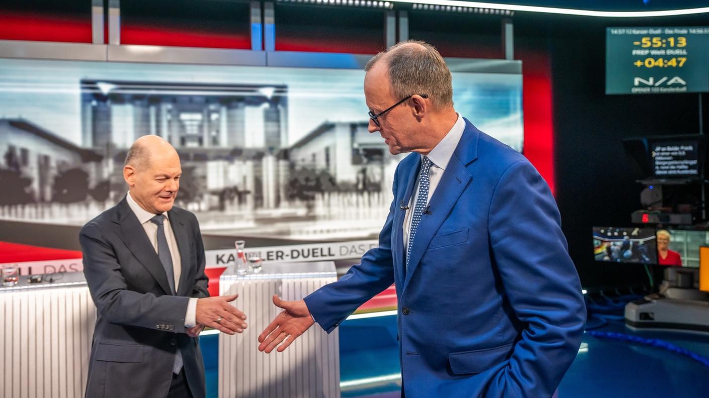I due principali sfidanti: Olaf Scholz e Friedrich Merz