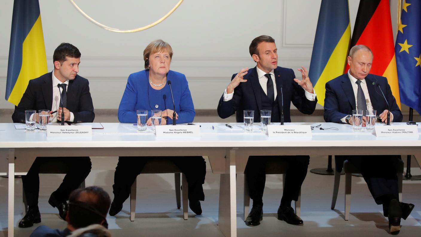 Volodymyr Zelensky, Angela Merkel, Emmanuel Macron e Vladimir Putin al termine del summit di lunedì