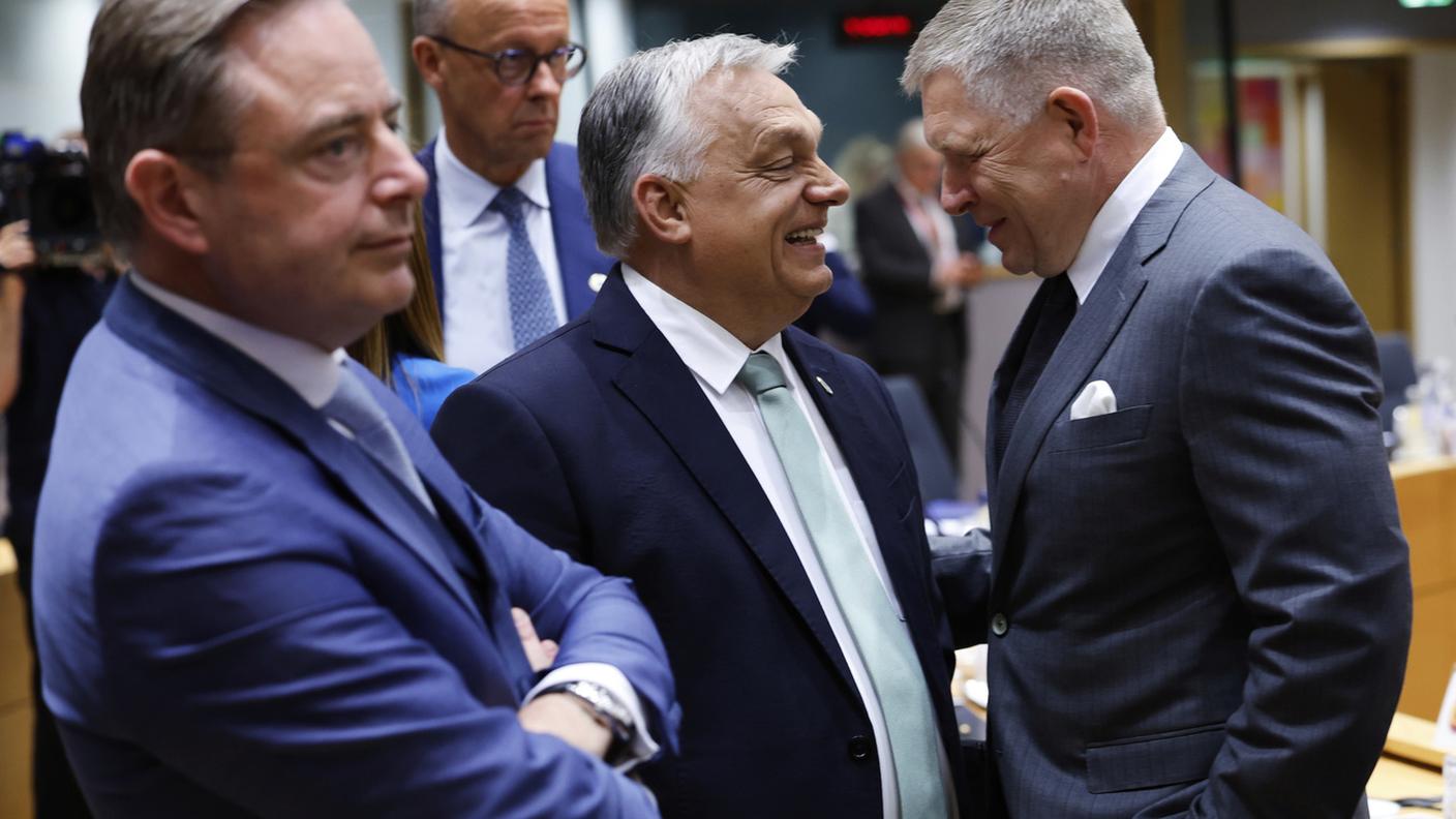 Umori diversi: il belga Bart De Wever in primo piano e il tedesco Friedrich Merz sullo sfondo, al centro e a desta l'ungherese Viktor Orban e lo slovacco Robert Fico