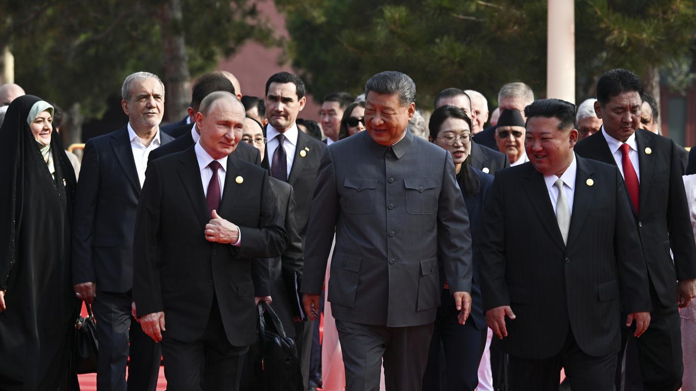 Da sinistra: Vladimir Putin, Xi Jinping e Kim Jong-un