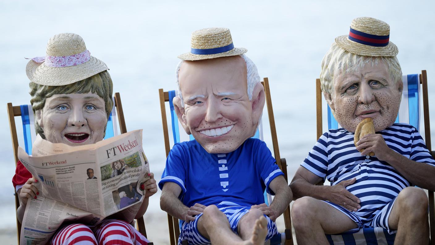 Maschere di Merkel, Biden e Johnson
