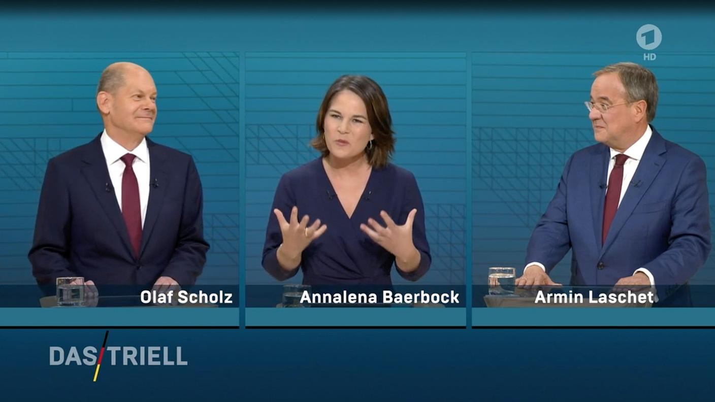 Da sinistra a destra il candidato dell'SPD, la candidata dei Verdi e il candidato di CDU/CSU