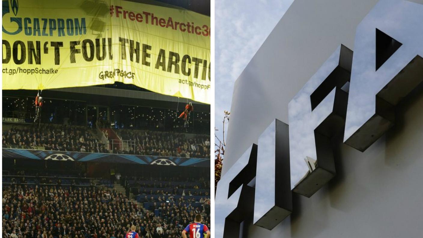 Lo striscione di protesta di Greenpeace a Basilea