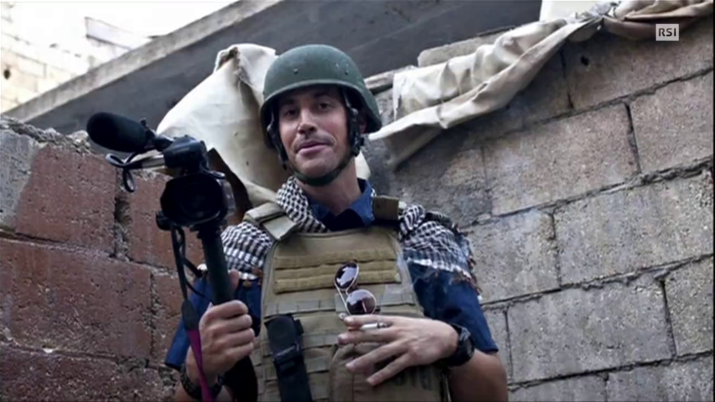 TG20.00 DEL 21.08.2014: " PER FOLEY UN RISCATTO MILIONARIO " DI RICCARDO BAGNATO