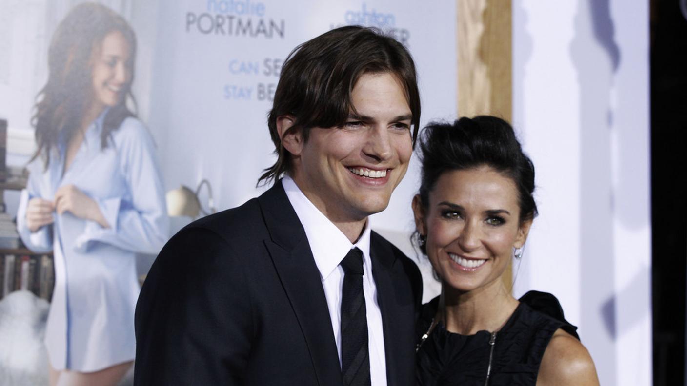 Aston con Demi Moore
