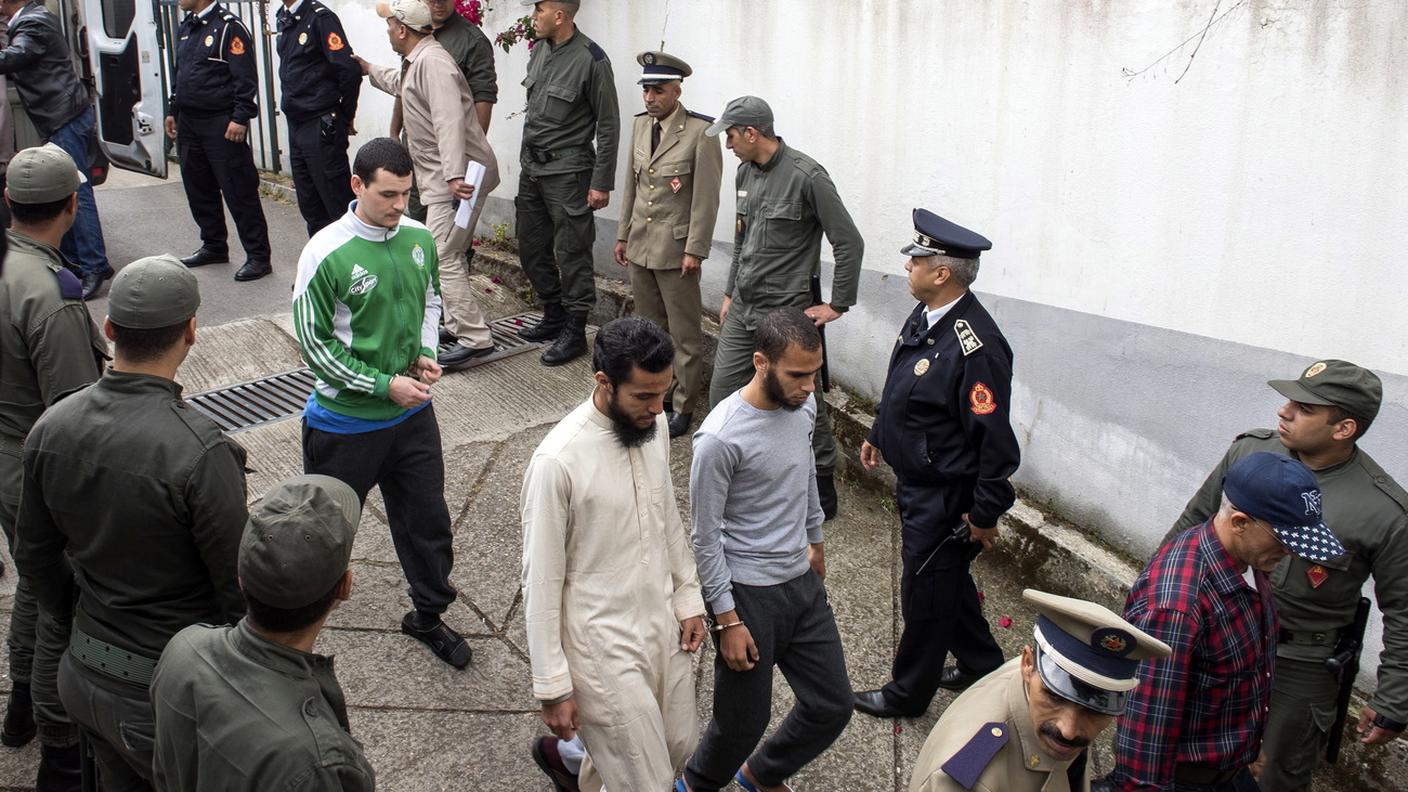 L'arrivo in tribunale di alcuni degli imputati