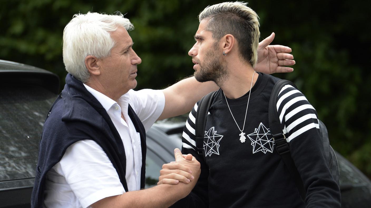 Con il padre all'arrivo a Feusisberg