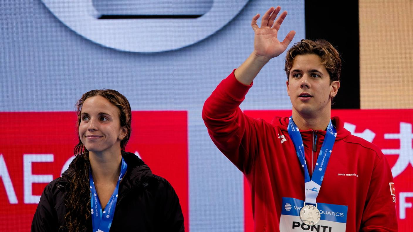 Al fianco di Regan Smith durante la premiazione finale